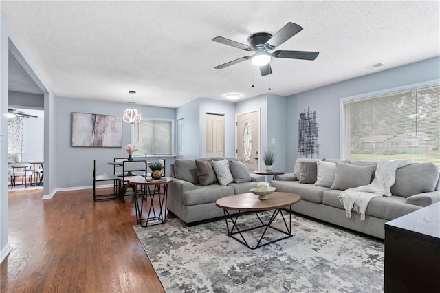 1694 Pheasant Dr, Atlanta, GA 30238 - living area with ceiling fan, a textured ceiling, plenty of natural light, and wood finished floors