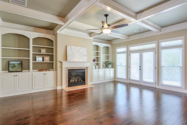 unfurnished living room featuring coffered ceiling, dark wood-type flooring, and beamed ceiling