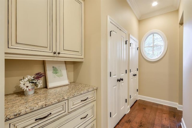 doorway with dark wood-type flooring and ornamental molding