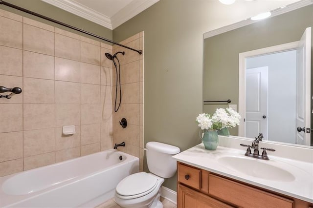 full bathroom featuring crown molding, toilet, vanity, and tiled shower / bath