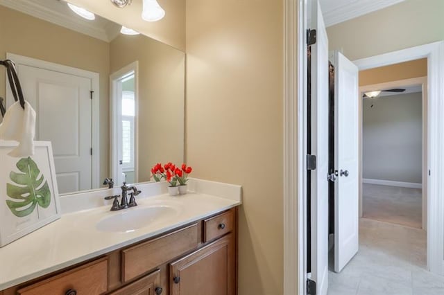 bathroom featuring vanity and crown molding