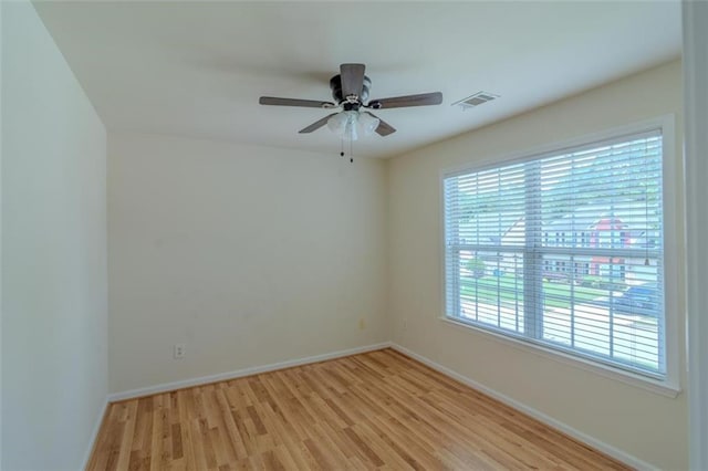 851 Roget Ct, Lawrenceville, GA 30045 - spare room featuring light wood-type flooring and ceiling fan
