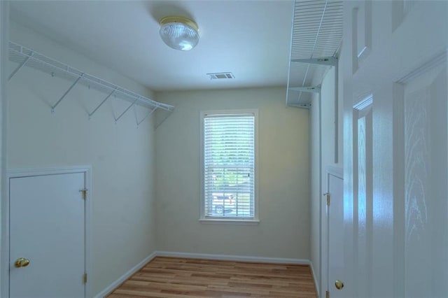 851 Roget Ct, Lawrenceville, GA 30045 - spacious closet with wood finished floors
