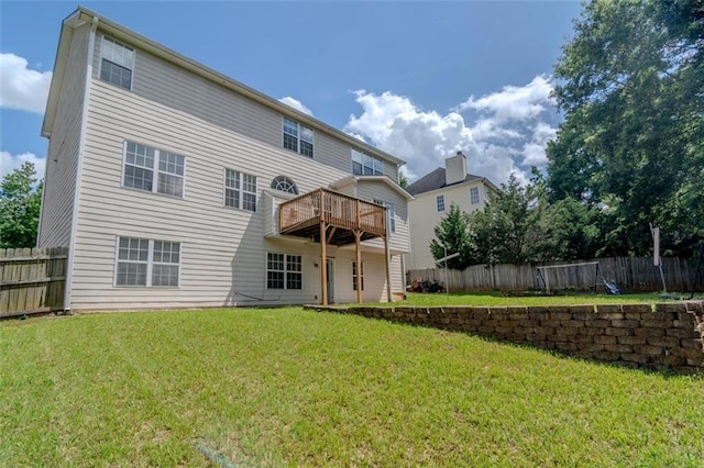 851 Roget Ct, Lawrenceville, GA 30045 - back of property featuring a fenced backyard and a wooden deck