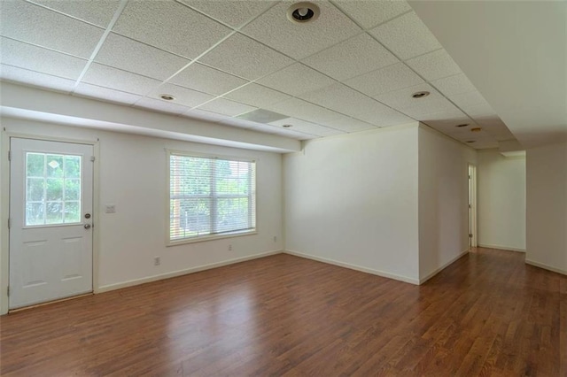 851 Roget Ct, Lawrenceville, GA 30045 - unfurnished living room featuring wood finished floors and a drop ceiling