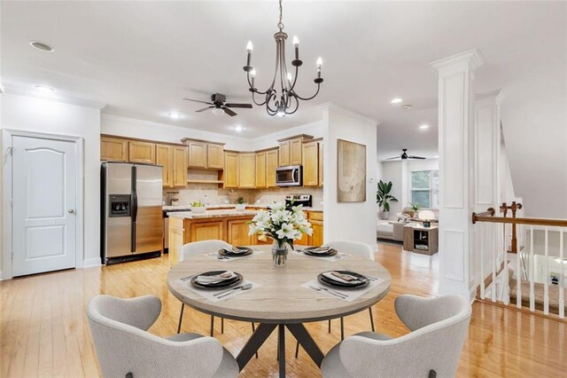 275 Blue Pointe Ct, Suwanee, GA 30024 - dining space with a chandelier, light wood-type flooring, ceiling fan, ornamental molding, and baseboards