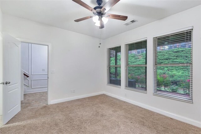 275 Blue Pointe Ct, Suwanee, GA 30024 - unfurnished room featuring carpet, baseboards, and a ceiling fan