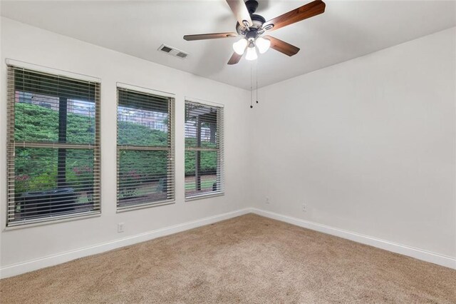 275 Blue Pointe Ct, Suwanee, GA 30024 - unfurnished room with a ceiling fan, light carpet, baseboards, and a sink