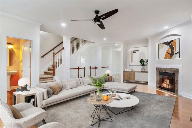 275 Blue Pointe Ct, Suwanee, GA 30024 - kitchen featuring appliances with stainless steel finishes, ceiling fan, a sink, a kitchen island, and backsplash