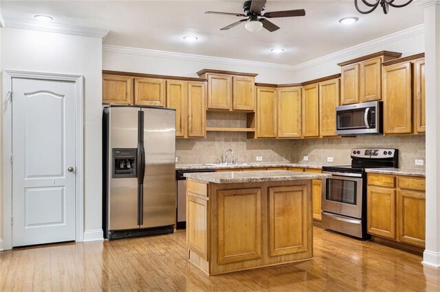 275 Blue Pointe Ct, Suwanee, GA 30024 - kitchen with stainless steel appliances, crown molding, light wood-type flooring, backsplash, and recessed lighting