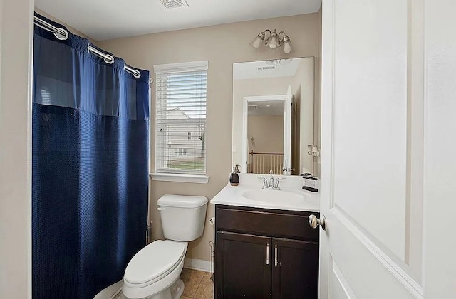 5076 Longview Walk, Decatur, GA 30035 - bathroom featuring tile patterned flooring, visible vents, toilet, vanity, and a shower with shower curtain