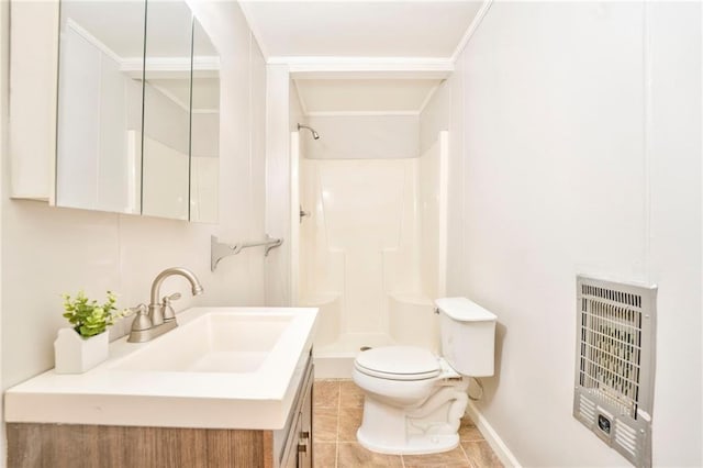 bathroom featuring tile patterned flooring, heating unit, toilet, and walk in shower