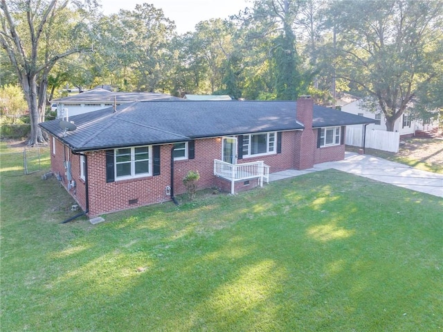 ranch-style home with a front yard