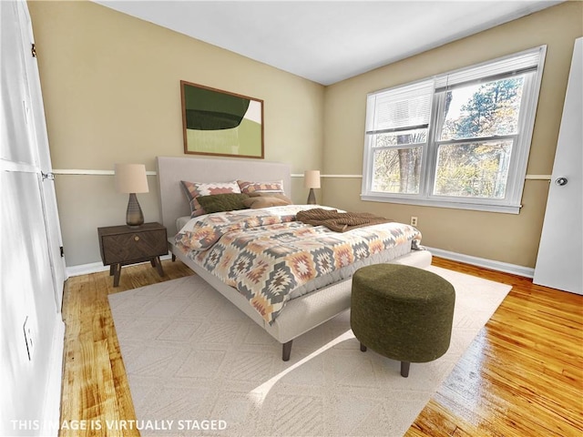 bedroom featuring wood-type flooring