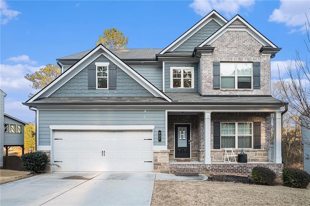 craftsman-style house with covered porch and a garage