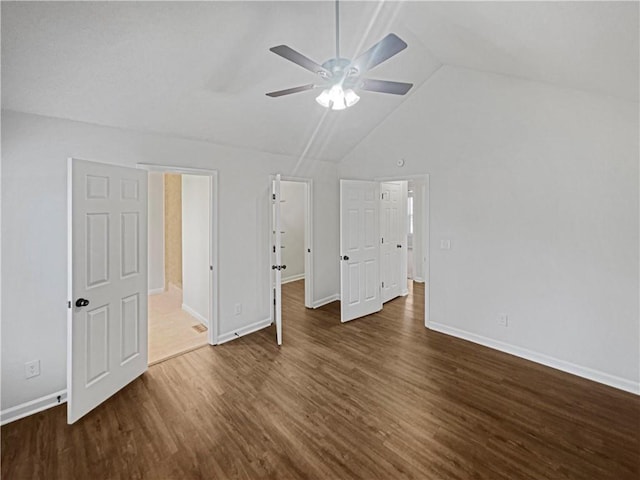 31 Mariner Way SE, Acworth, GA 30102 - unfurnished bedroom featuring a ceiling fan, dark wood finished floors, high vaulted ceiling, and baseboards