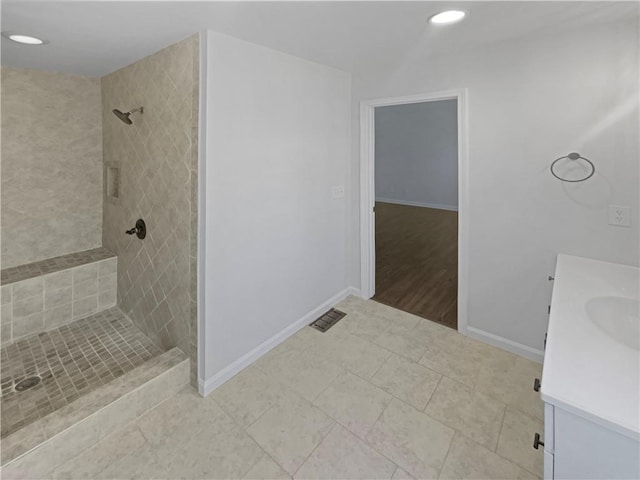 31 Mariner Way SE, Acworth, GA 30102 - bathroom featuring recessed lighting, vanity, visible vents, baseboards, and a stall shower