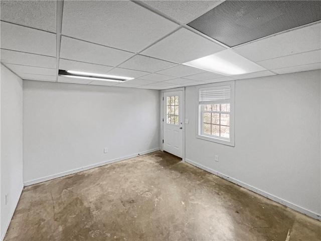 31 Mariner Way SE, Acworth, GA 30102 - unfurnished room featuring baseboards, visible vents, a paneled ceiling, and unfinished concrete floors
