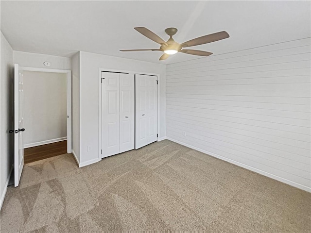 31 Mariner Way SE, Acworth, GA 30102 - unfurnished bedroom with a ceiling fan, a closet, baseboards, and carpet flooring