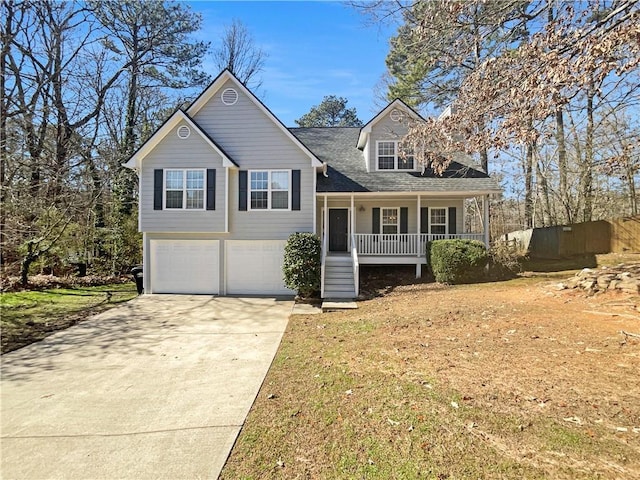 31 Mariner Way SE, Acworth, GA 30102 - view of front of property with a garage, covered porch, driveway, and fence