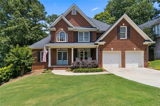 2713 Misty Rock Cv, Dacula, GA 30019 - view of front of property featuring concrete driveway, brick siding, and a front yard