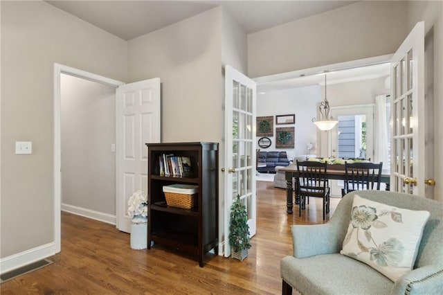 2713 Misty Rock Cv, Dacula, GA 30019 - sitting room with french doors and wood finished floors