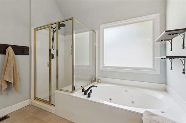2713 Misty Rock Cv, Dacula, GA 30019 - full bathroom with a shower stall, a tub with jets, and tile patterned flooring