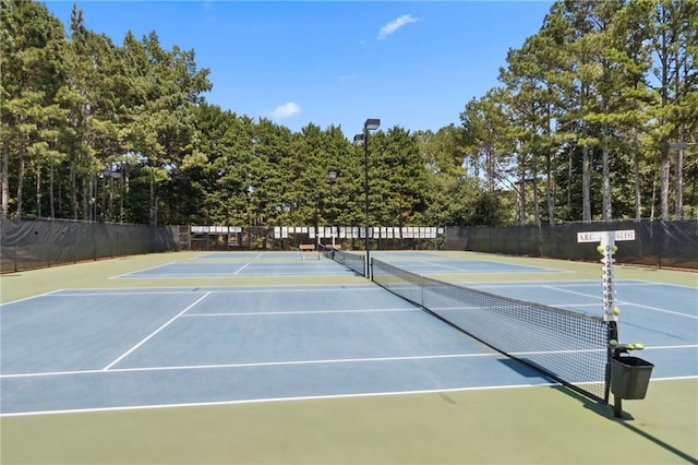 2713 Misty Rock Cv, Dacula, GA 30019 - view of tennis court featuring community basketball court and view of scattered trees
