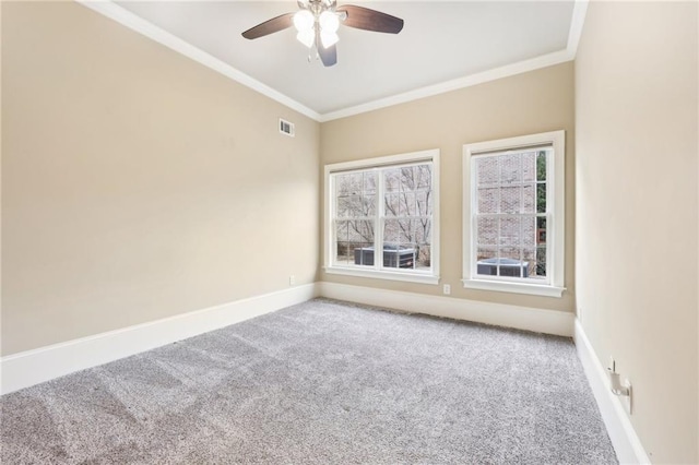 unfurnished room featuring carpet flooring, ceiling fan, and crown molding