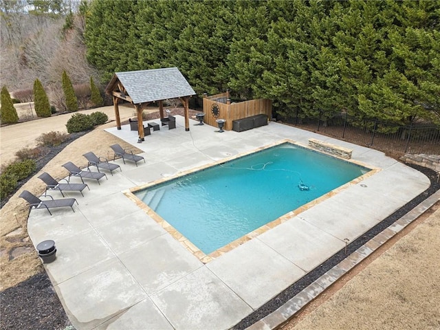 view of swimming pool featuring a gazebo, a patio, and an outdoor hangout area