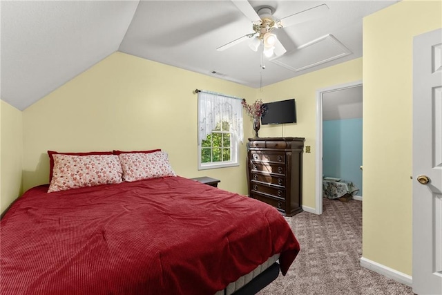 carpeted bedroom with vaulted ceiling and ceiling fan