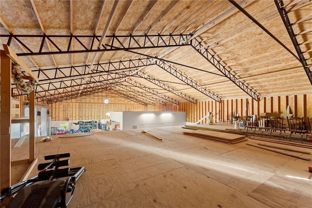 miscellaneous room with lofted ceiling