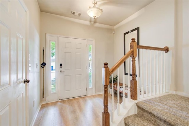 3622 Utoy Dr, South Fulton, GA 30331 - foyer entrance featuring wood finished floors, stairs, and baseboards