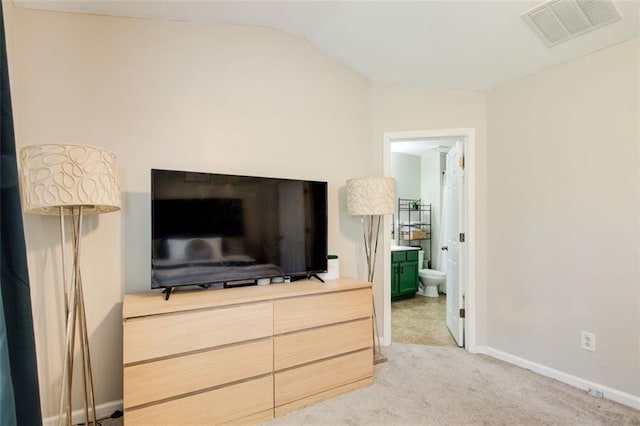 3622 Utoy Dr, South Fulton, GA 30331 - bedroom with vaulted ceiling, light carpet, connected bathroom, and baseboards