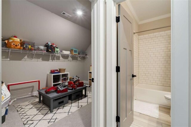 811 Walnut River Trl, Hoschton, GA 30548 - full bath featuring crown molding, bathtub / shower combination, toilet, and visible vents