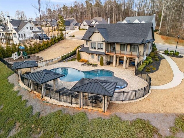811 Walnut River Trl, Hoschton, GA 30548 - view of pool featuring a fenced backyard, a fenced in pool, a patio, and a residential view