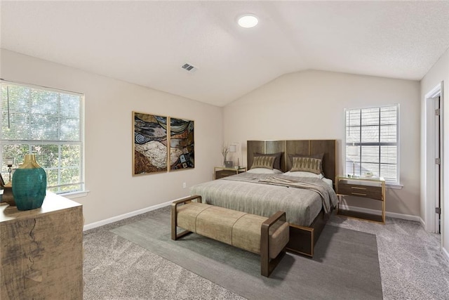 bedroom featuring carpet, visible vents, vaulted ceiling, and baseboards