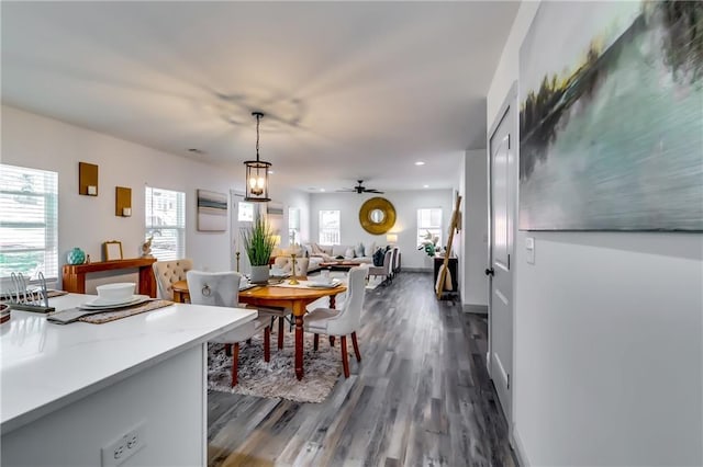 dining room with recessed lighting, baseboards, dark wood-style flooring, and ceiling fan