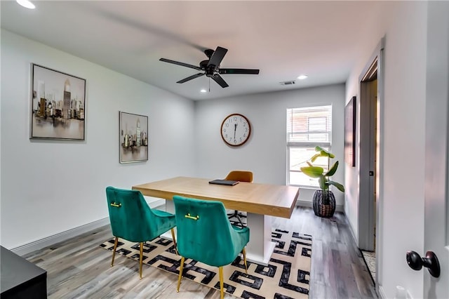 office space featuring visible vents, wood finished floors, recessed lighting, baseboards, and ceiling fan