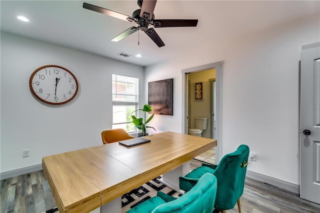 office featuring visible vents, baseboards, recessed lighting, wood finished floors, and a ceiling fan