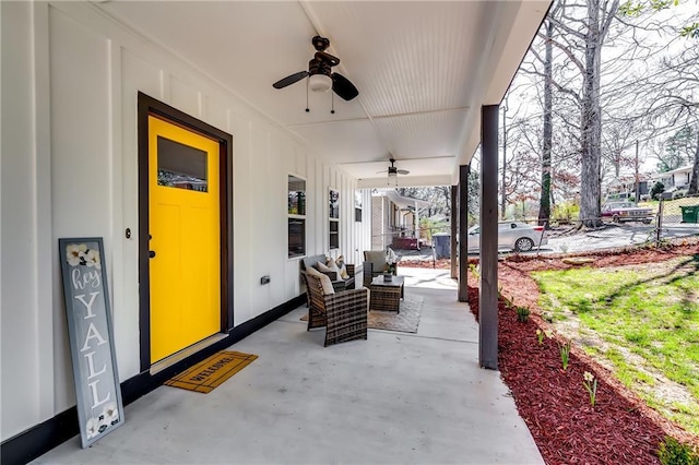 view of patio / terrace featuring a porch, ceiling fan, and fence