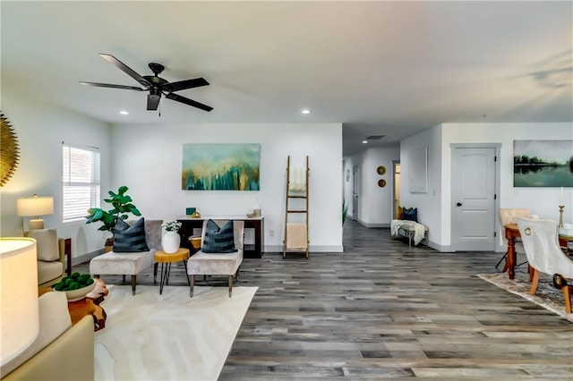 living room featuring recessed lighting, baseboards, wood finished floors, and ceiling fan