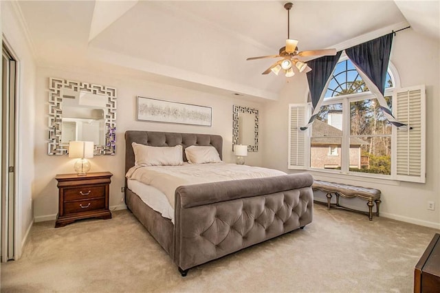 carpeted bedroom with lofted ceiling and ceiling fan