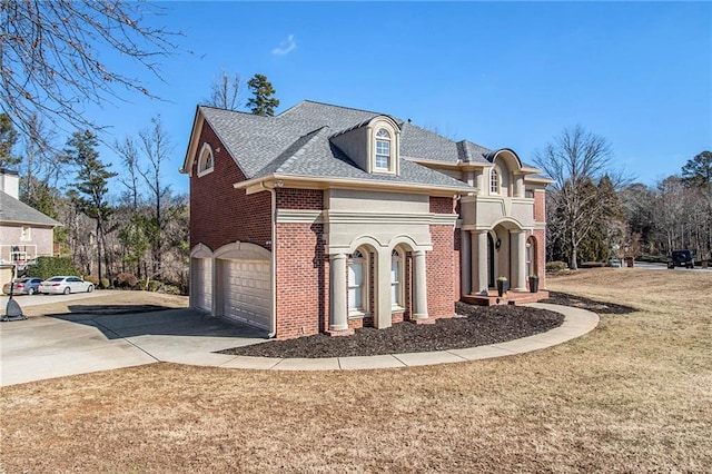 view of home's exterior with a garage and a yard