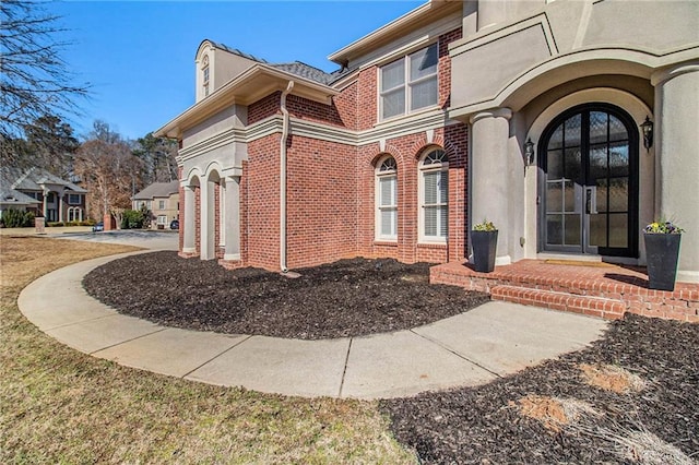 doorway to property featuring french doors