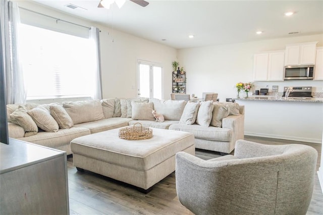 2159 Redfern Rd, Dacula, GA 30019 - living area with ceiling fan, wood finished floors, and recessed lighting