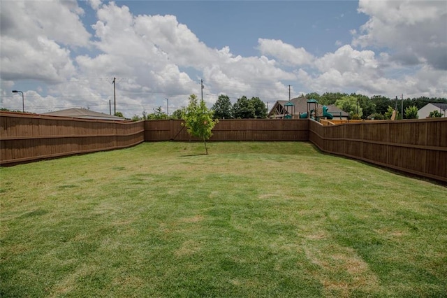 2159 Redfern Rd, Dacula, GA 30019 - fenced backyard with a playground