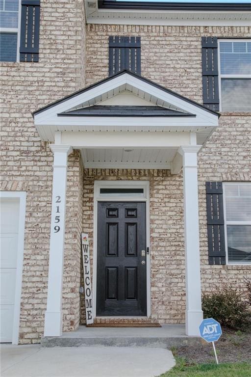 2159 Redfern Rd, Dacula, GA 30019 - view of exterior entry with brick siding