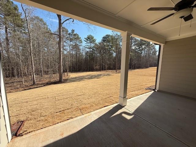view of patio featuring a ceiling fan