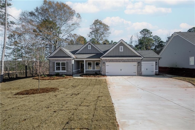 craftsman-style home featuring a shingled roof, concrete driveway, an attached garage, board and batten siding, and brick siding